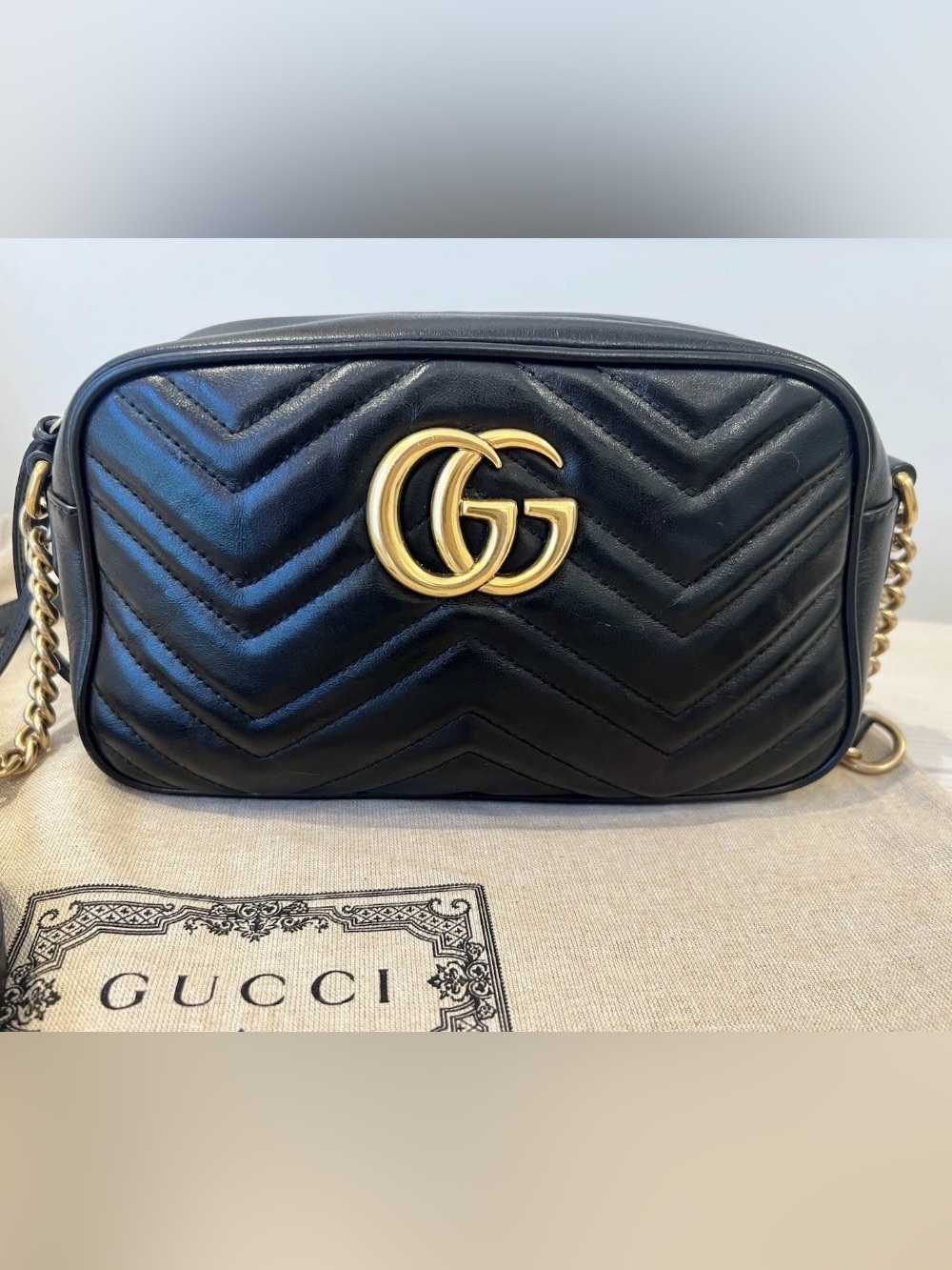 Gucci GG Mormont gold shoulder bag small black leather